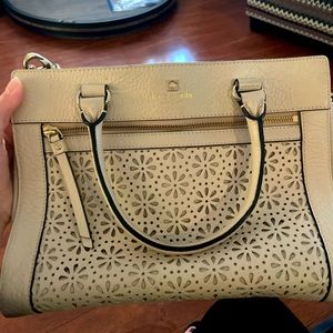 Kate Spade cream purse with leather cleaner